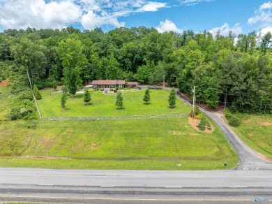 Discover this incredible property that combines the comfort of a on Scottsboro Golf and Country Club in Alabama - for sale on GolfHomes.com, golf home, golf lot