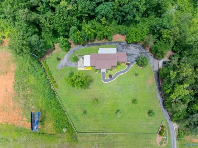 Discover this incredible property that combines the comfort of a on Scottsboro Golf and Country Club in Alabama - for sale on GolfHomes.com, golf home, golf lot