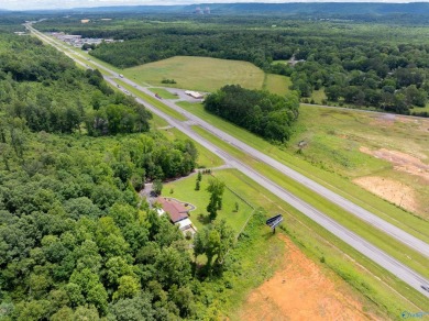 Discover this incredible property that combines the comfort of a on Scottsboro Golf and Country Club in Alabama - for sale on GolfHomes.com, golf home, golf lot