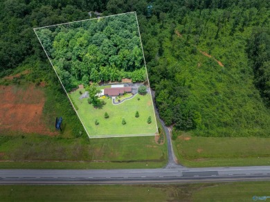 Discover this incredible property that combines the comfort of a on Scottsboro Golf and Country Club in Alabama - for sale on GolfHomes.com, golf home, golf lot