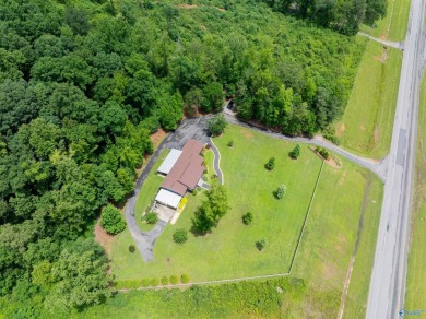 Discover this incredible property that combines the comfort of a on Scottsboro Golf and Country Club in Alabama - for sale on GolfHomes.com, golf home, golf lot