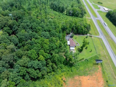 Discover this incredible property that combines the comfort of a on Scottsboro Golf and Country Club in Alabama - for sale on GolfHomes.com, golf home, golf lot