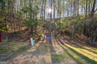 Build on this 0.28-acre lot that backs directly to the golf on Innsbruck Resort and Golf Club in Georgia - for sale on GolfHomes.com, golf home, golf lot