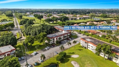 Bright & Beautiful partially furnished home centrally located in on Hollybrook Golf and Tennis Club  in Florida - for sale on GolfHomes.com, golf home, golf lot