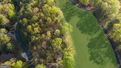 Build on this 0.28-acre lot that backs directly to the golf on Innsbruck Resort and Golf Club in Georgia - for sale on GolfHomes.com, golf home, golf lot