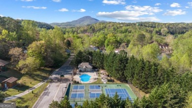 Build on this 0.28-acre lot that backs directly to the golf on Innsbruck Resort and Golf Club in Georgia - for sale on GolfHomes.com, golf home, golf lot