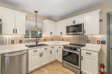 This modified Austin Model in the Village of Alhambra is priced on The Links of Spruce Creek in Florida - for sale on GolfHomes.com, golf home, golf lot