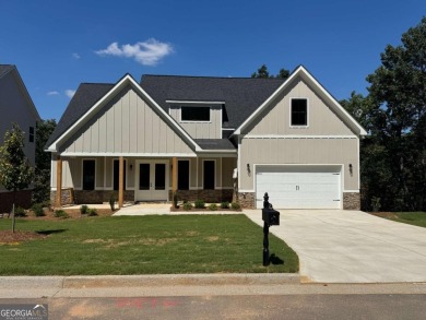 Welcome to the Littleson Plan at Carter Grove - where timeless on The Plantation Golf Club in Georgia - for sale on GolfHomes.com, golf home, golf lot