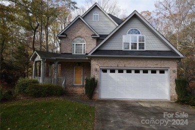 Unique two story with basement in golf course community. Nice on Pine Island Country Club in North Carolina - for sale on GolfHomes.com, golf home, golf lot