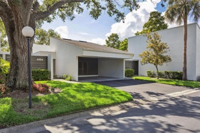 Meticulously maintained, beautifully updated and is very well on Carrollwood Country Club in Florida - for sale on GolfHomes.com, golf home, golf lot