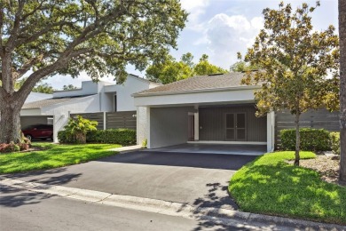 Meticulously maintained, beautifully updated and is very well on Carrollwood Country Club in Florida - for sale on GolfHomes.com, golf home, golf lot