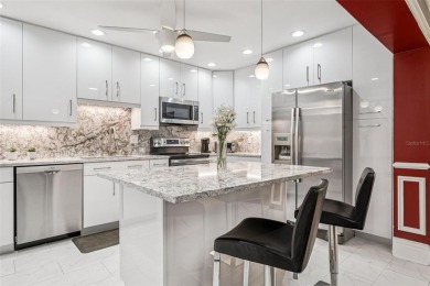 Meticulously maintained, beautifully updated and is very well on Carrollwood Country Club in Florida - for sale on GolfHomes.com, golf home, golf lot