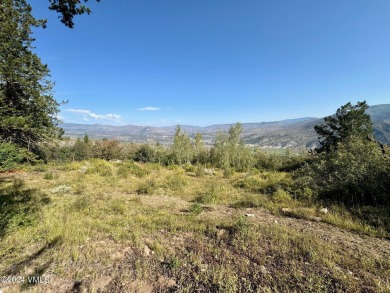 Touted as one of the best view lots in the Travis Creek on Red Sky Ranch and Golf Club in Colorado - for sale on GolfHomes.com, golf home, golf lot