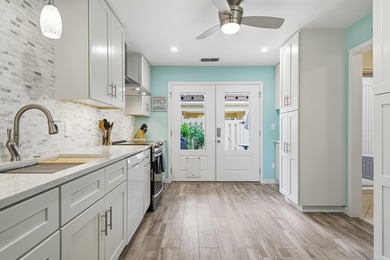 This BEAUTIFULLY RENOVATED, 1-story, END UNIT townhome is *THE on Golf Club at Bluewater Bay Resort in Florida - for sale on GolfHomes.com, golf home, golf lot