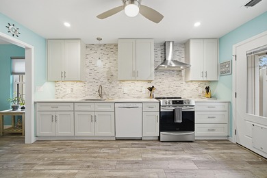 This BEAUTIFULLY RENOVATED, 1-story, END UNIT townhome is *THE on Golf Club at Bluewater Bay Resort in Florida - for sale on GolfHomes.com, golf home, golf lot
