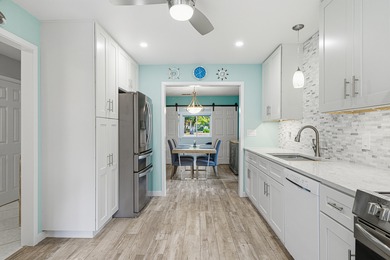 This BEAUTIFULLY RENOVATED, 1-story, END UNIT townhome is *THE on Golf Club at Bluewater Bay Resort in Florida - for sale on GolfHomes.com, golf home, golf lot