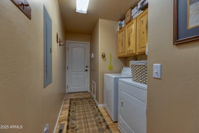 Situated on the 7th tee of Pinetop Lakes Country Club in the on Pinetop Lakes Golf and Country Club in Arizona - for sale on GolfHomes.com, golf home, golf lot