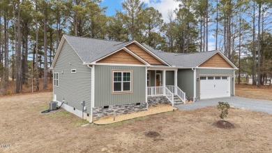 Welcome to first floor living at its finest.  This beautifully on Reedy Creek Golf Course in North Carolina - for sale on GolfHomes.com, golf home, golf lot