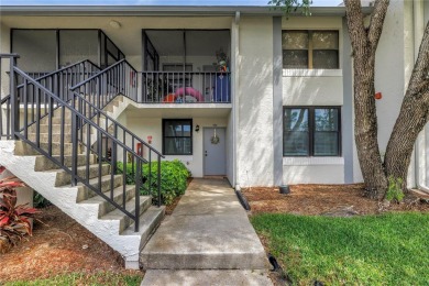 Experience refined Florida living in this exceptional, move-in on Feather Sound Country Club in Florida - for sale on GolfHomes.com, golf home, golf lot