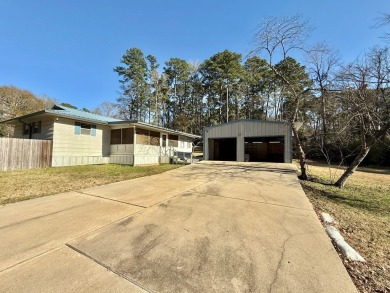 Discover the potential of this cozy 2-bed, 2-bath home in the on Pendleton Harbor in Texas - for sale on GolfHomes.com, golf home, golf lot