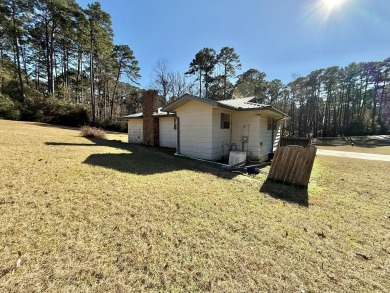 Discover the potential of this cozy 2-bed, 2-bath home in the on Pendleton Harbor in Texas - for sale on GolfHomes.com, golf home, golf lot