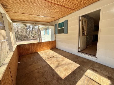 Discover the potential of this cozy 2-bed, 2-bath home in the on Pendleton Harbor in Texas - for sale on GolfHomes.com, golf home, golf lot