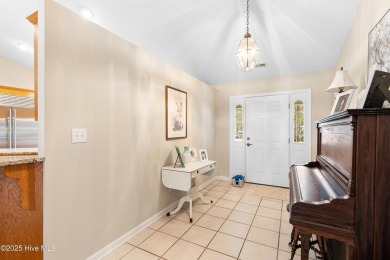 Don't miss your chance to own this beautiful 2,600-square-foot on Sea Trail Golf Resort in North Carolina - for sale on GolfHomes.com, golf home, golf lot