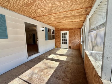 Discover the potential of this cozy 2-bed, 2-bath home in the on Pendleton Harbor in Texas - for sale on GolfHomes.com, golf home, golf lot