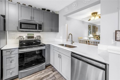 Experience refined Florida living in this exceptional, move-in on Feather Sound Country Club in Florida - for sale on GolfHomes.com, golf home, golf lot