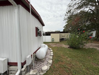 FULLY FURNISHED, WELL-MAINTAINED 2-BEDROOM, 1-BATHROOM HOME on Grasslands Golf and Country Club in Florida - for sale on GolfHomes.com, golf home, golf lot