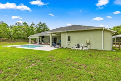 Discover this beautiful single-family remodeled home nestled in on Pine Ridge Community Golf and Country Club in Florida - for sale on GolfHomes.com, golf home, golf lot