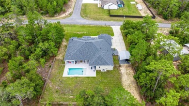 Discover this beautiful single-family remodeled home nestled in on Pine Ridge Community Golf and Country Club in Florida - for sale on GolfHomes.com, golf home, golf lot