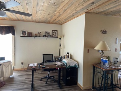 This newly remodeled, upper-level condominium offers a private on Antelope Hills Golf Course in Wyoming - for sale on GolfHomes.com, golf home, golf lot