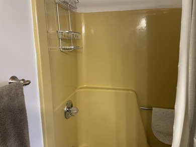 This newly remodeled, upper-level condominium offers a private on Antelope Hills Golf Course in Wyoming - for sale on GolfHomes.com, golf home, golf lot