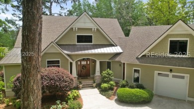 A view that stops you in your tracks - lagoon to golf, as far as on Moss Creek Golf Club in South Carolina - for sale on GolfHomes.com, golf home, golf lot