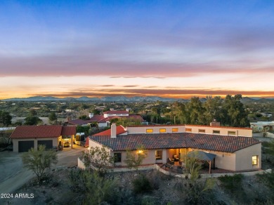 Welcome to your dream Spanish-style retreat nestled within the on Wickenburg Country Club in Arizona - for sale on GolfHomes.com, golf home, golf lot