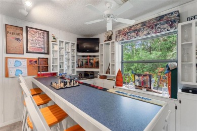Charming Canal-Front Home on a Full Acre in Indian Lake Estates! on Indian Lake Estates Golf and Country Club in Florida - for sale on GolfHomes.com, golf home, golf lot