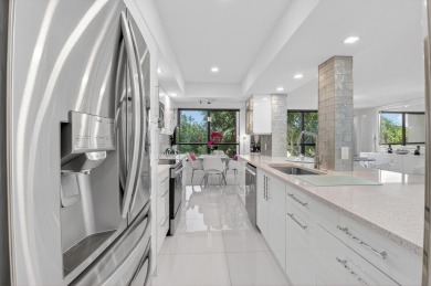 Discover luxury living in this beautifully renovated condo at on Boca West Golf and Country Club in Florida - for sale on GolfHomes.com, golf home, golf lot