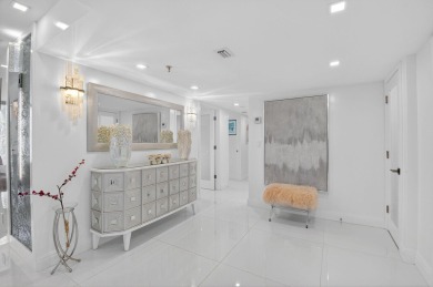 Discover luxury living in this beautifully renovated condo at on Boca West Golf and Country Club in Florida - for sale on GolfHomes.com, golf home, golf lot