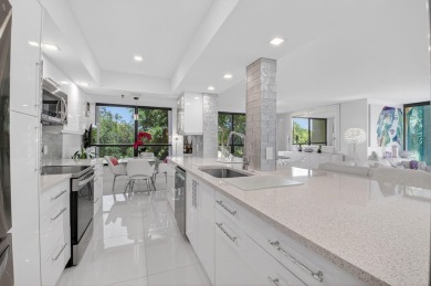 Discover luxury living in this beautifully renovated condo at on Boca West Golf and Country Club in Florida - for sale on GolfHomes.com, golf home, golf lot
