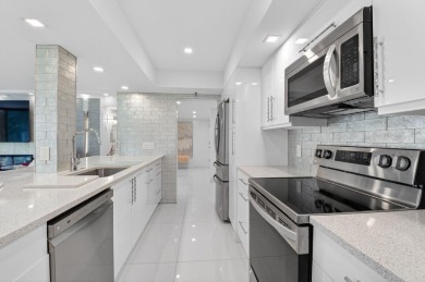 Discover luxury living in this beautifully renovated condo at on Boca West Golf and Country Club in Florida - for sale on GolfHomes.com, golf home, golf lot