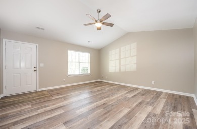 ONE LEVEL, END UNIT Move-in Ready: Newly painted throughout and on Raintree Country Club in North Carolina - for sale on GolfHomes.com, golf home, golf lot