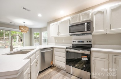 ONE LEVEL, END UNIT Move-in Ready: Newly painted throughout and on Raintree Country Club in North Carolina - for sale on GolfHomes.com, golf home, golf lot