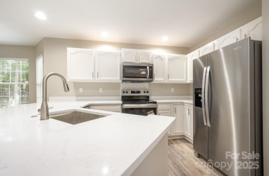 ONE LEVEL, END UNIT Move-in Ready: Newly painted throughout and on Raintree Country Club in North Carolina - for sale on GolfHomes.com, golf home, golf lot