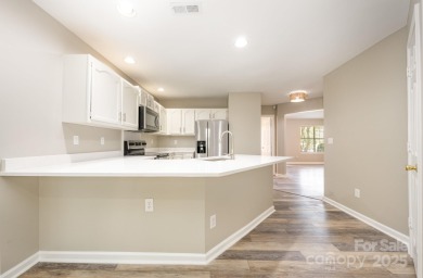 ONE LEVEL, END UNIT Move-in Ready: Newly painted throughout and on Raintree Country Club in North Carolina - for sale on GolfHomes.com, golf home, golf lot