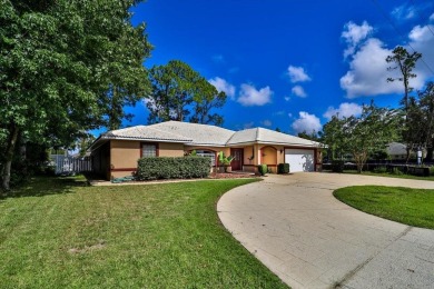 Discover the charm of 57 Woodhollow Dr, a stunning custom-built on The Grand Club - Pine Lakes Course in Florida - for sale on GolfHomes.com, golf home, golf lot