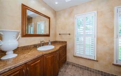 An Amazing Ensemble of Stunning Views, Serene Privacy and the on East Lake Woodlands Country Club in Florida - for sale on GolfHomes.com, golf home, golf lot
