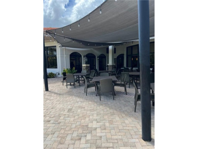 Enjoy resort style living in this stunning 2 bed 2bath + den on Naples Heritage Golf and Country Club in Florida - for sale on GolfHomes.com, golf home, golf lot