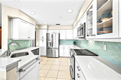 A SPECIAL UNIT WITH STUNNING LAKE VIEWS and NO FLOOD DAMAGE from on Bonita Bay West in Florida - for sale on GolfHomes.com, golf home, golf lot