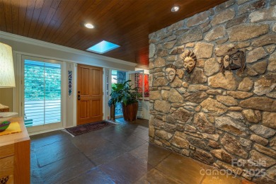 A rare opportunity awaits you in this secluded gem. You can live on Biltmore Forest Country Club in North Carolina - for sale on GolfHomes.com, golf home, golf lot